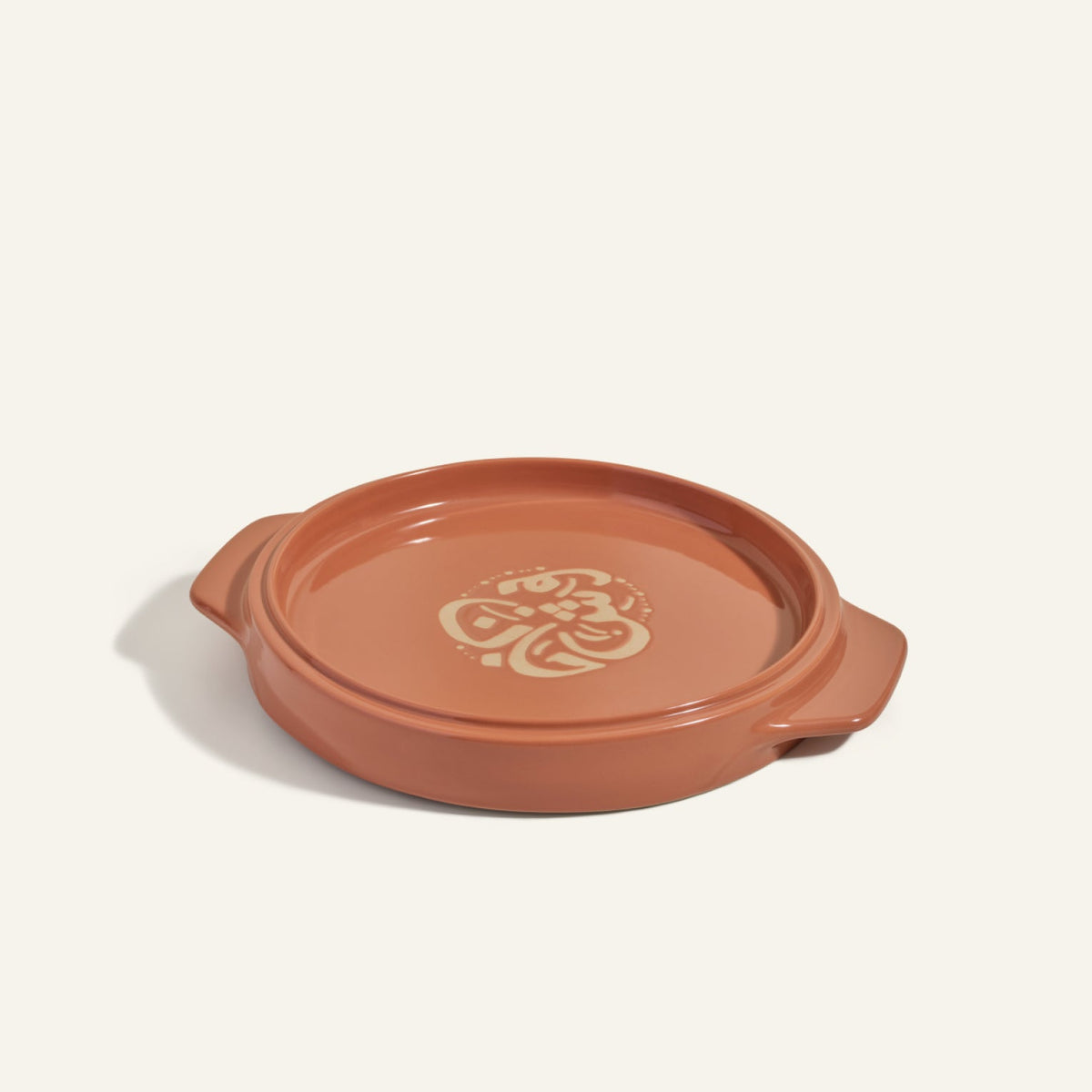 Plat de cuisson à retourner
