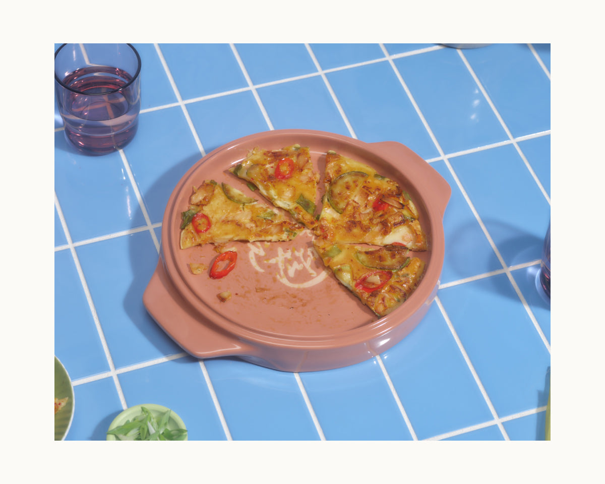 Plat de cuisson à retourner