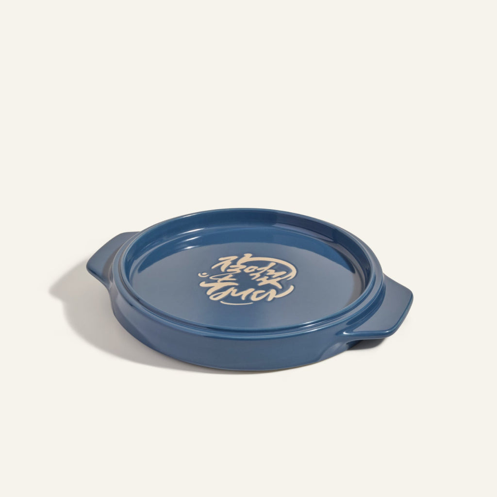Plat de cuisson à retourner